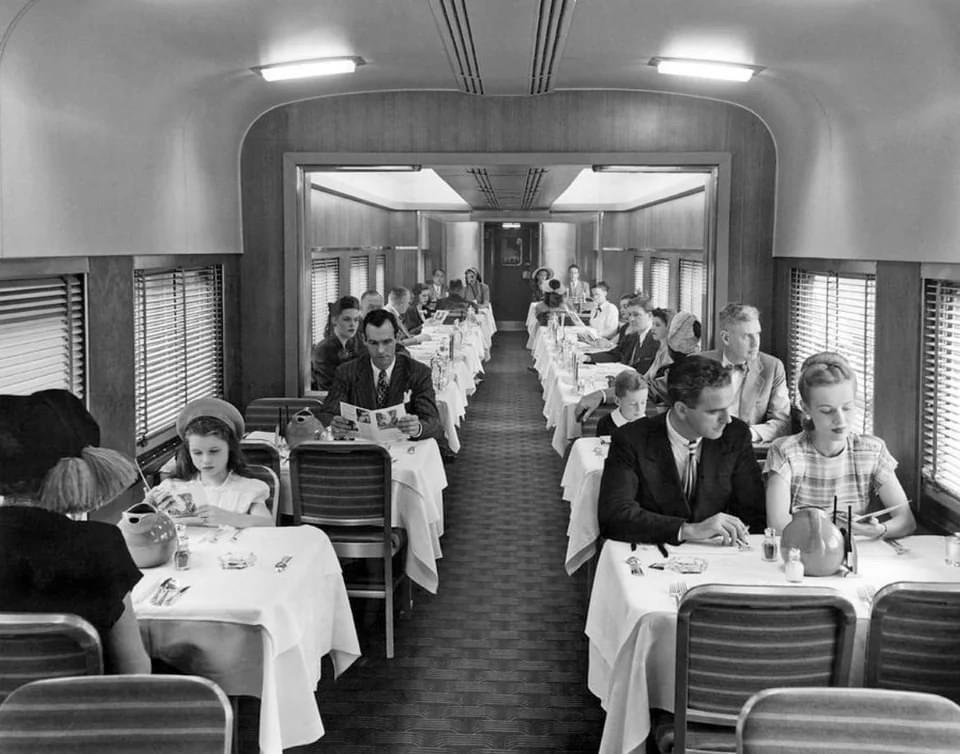 Dining on the Rails: A Glimpse into the 1940s Train Dining Car Experience in the United States